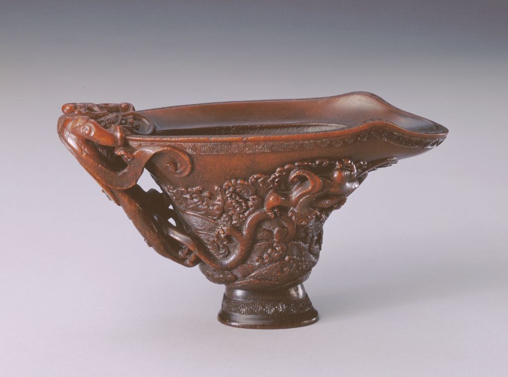 图片[2]-Rhinoceros horn carved three-dragon handle sea water dragon tiger cup-China Archive